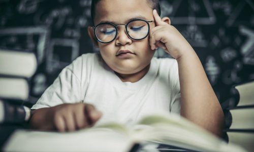 boys-with-glasses-write-books-think-classroom (1)
